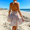 deb72ae9b9e2365efa7ce375d9be331e41632f9c3caa84ea92f9897a3da29178.jpg Seaside Floral Strap Mini Dress